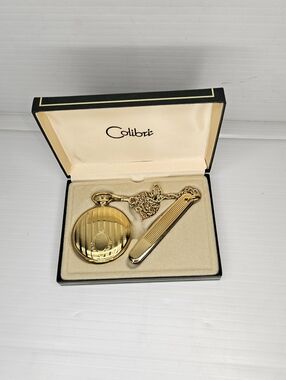 Vintage Colibri quartz pocket watch and knife